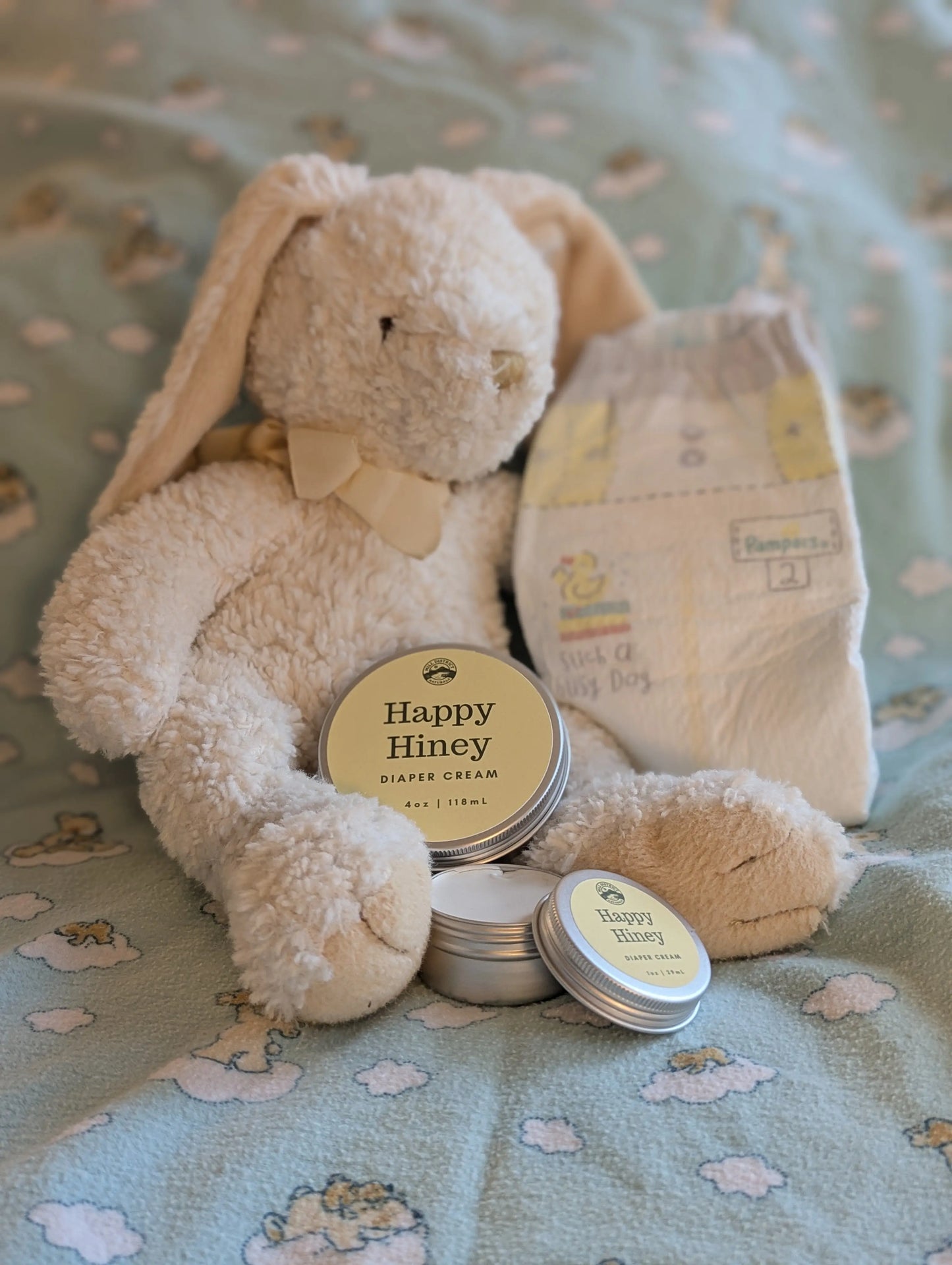 beef tallow diaper cream with a stuffed bunny and diaper